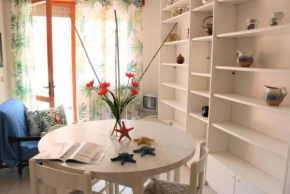 Cozy up in our cute apartment Bibione